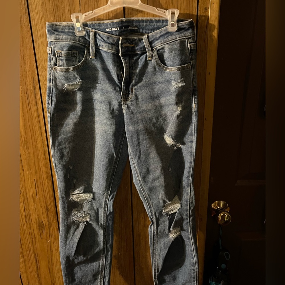 Ripped blue jean pants